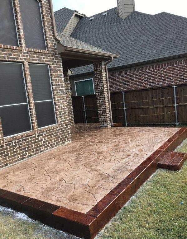 Gorgeous stamped concrete patio with a bold border.