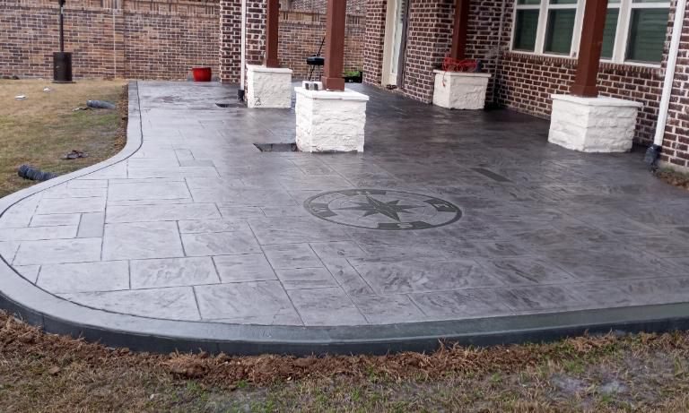 Patio expansion with stamped concrete.